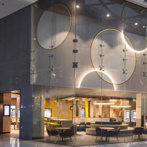 A McDonalds inside a large building.