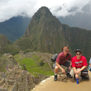 Lori and her family on a mountain overlooking an ancient city.