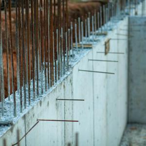Steel bars poking out from cement