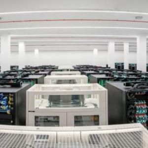 A room full of large computer servers.
