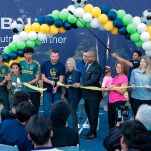 LA Galaxy's President Chris Klein and Galaxy players Jalen Neal and Daniel Aguirre join Long Beach Mayor Rex Richardson for the ribbon cutting ceremony.