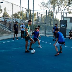 Kids play on the new mini-pitch fields in Long Beach installed earlier this year by AEG's LA Galaxy Foundation, Herbalife, and the U.S. Soccer Foundation.
