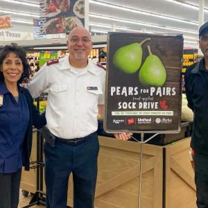 Team members with Pears for Pairs sign