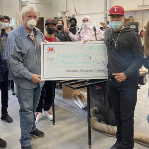 Students and teachers receiving $5,000 check