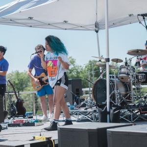 HARMAN employees jamming in a band.