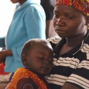 Mother holding child