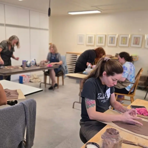 Mandy working on a pottery project.