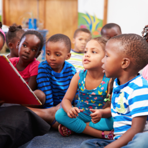 young children sitting together for story time