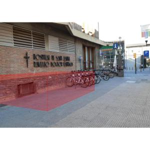 Proposed area marked in a transparent red box next to a building.