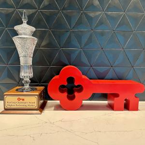 KeyBank Market of the Year Trophy and Red Key logo.