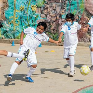 Children playing soccer