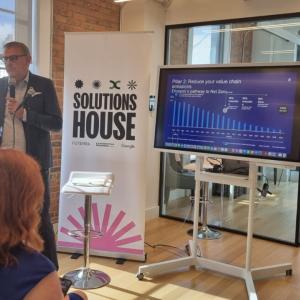 Mats presenting to a room of people