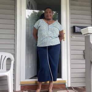 Mattie on their front porch