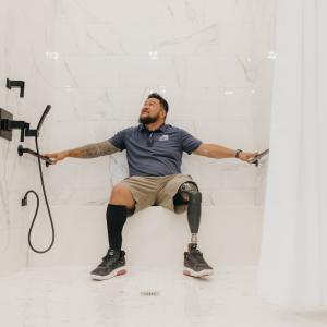 U.S. Army Sergeant Anesi “Maverick” Tu’ufuli in his newly built bathroom.