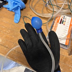 Glove with balloon