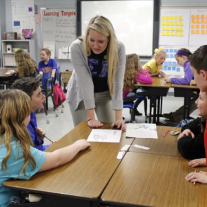 Megan Terry and a classroom of children