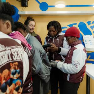 Visitors interact with hands on science in the Curiosity Cube