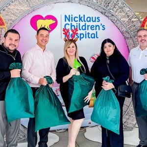 Group photo with toy donations