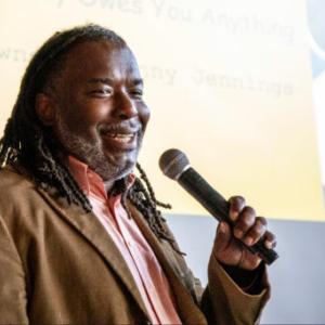 smiling person with Mic