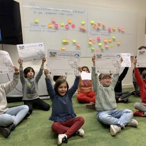 a photo of children in a classroom 