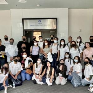 The group of 30 students pose for a photo