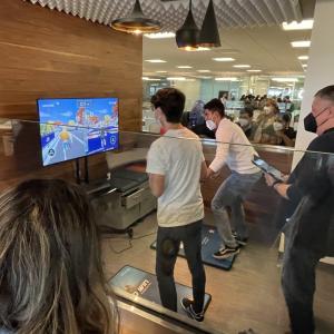 a few students playing a video game