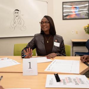 KeyBank and everfi representatives with students.