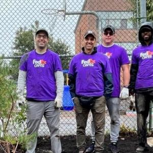  FedEx Montreal team wearing matching t-shirts 