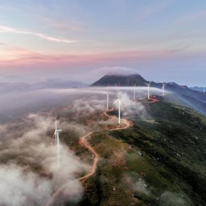 mountain pathway with wind turbines