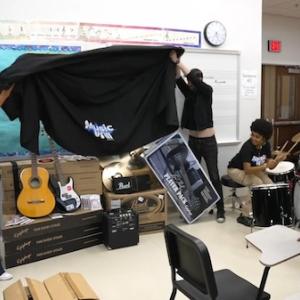 Unveiling the musical instruments at John C. Fremont High School.