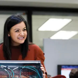 smiling Koch employee Lisa Loera