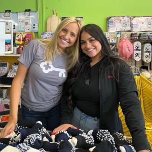 KeyBank volunteers gathering shoes and clothes for kids.