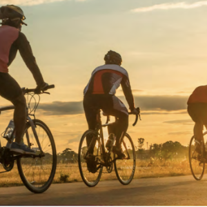 Bikers Riding into a sunset.