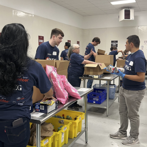 volunteers unpacking boxes