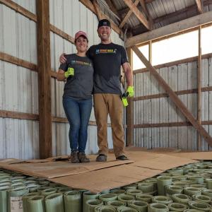 Two Hershey volunteers standing together 