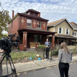 Victor Laurenza, KeyBank Western Pennsylvania Market President speaking in front of a neighborhood that will be assisted by the grant.