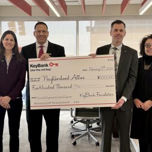 KeyBank and Neighborhood Allies Team Members shown with a $500,000 grant check.