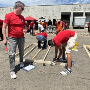 KeyBank volunteers shown building a home.