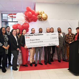 As part of the festivities, KeyBank presented a community grant to Dawn Ewing (center, 5th from right), Executive Director of Project Morry in Port Chester