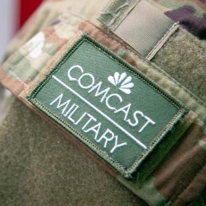 A Comcast military badge 
