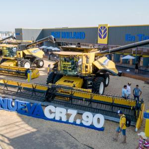 Wide view of large construction vehicles on display