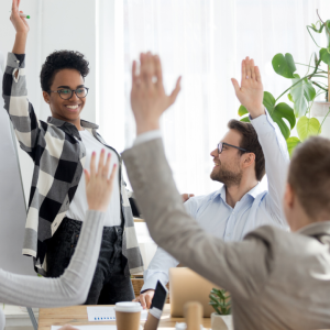 Volunteers raising their hands. 