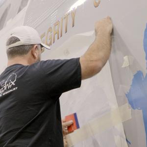 People putting warp on the plane