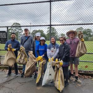 Earth Day volunteers from Nielsen posing for a photo.