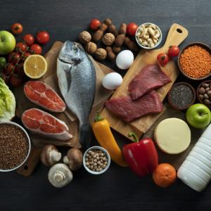 Array of different meat, fish, fruits and vegetables.