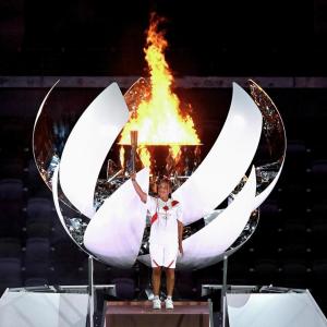 Person holding the olympic torch 