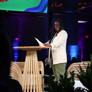 A person stood on stage