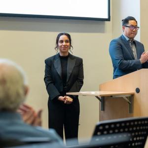 A person stood in front of an audience during an event