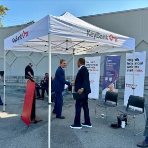 KeyBank CEO, Chris Gorman, and Operation HOPE CEO John Hope Bryant shake hands.