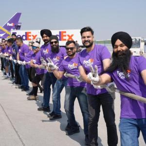 Volunteers play tug-of-war
